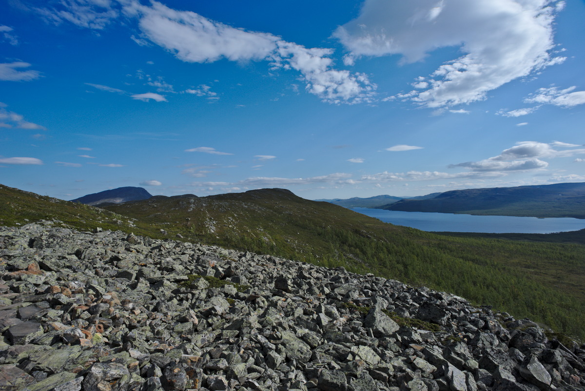 View toward lake Kilpisjärvi rocks, mountains, and lake