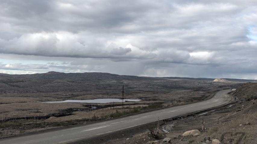 road in devastated landscape near Nikel