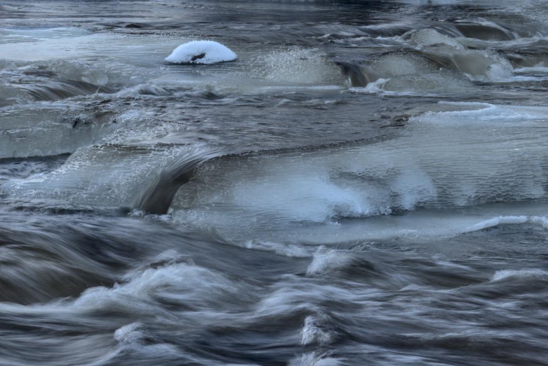 rapid with ice covered stones